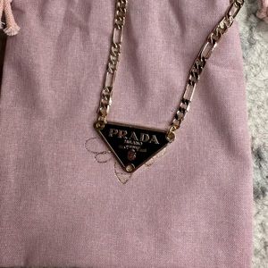 Black and gold Prada necklace